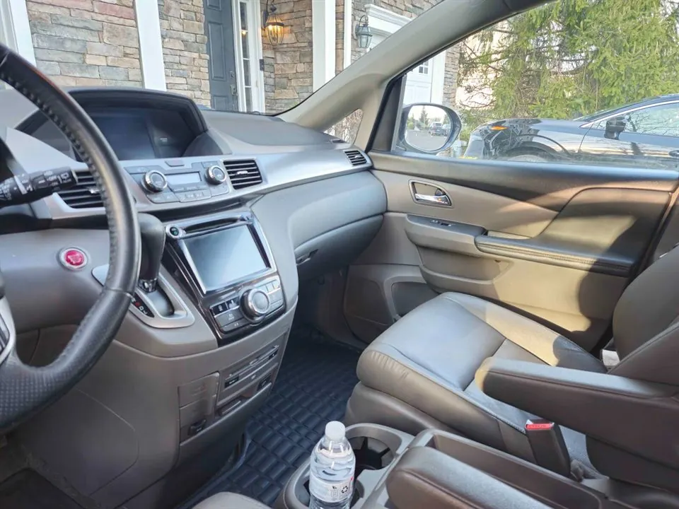 Dashboard and center console after detailing — surfaces dust-free and polished