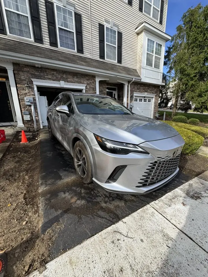 Silver Lexus RX before detailing — paint dull and dusty in daylight